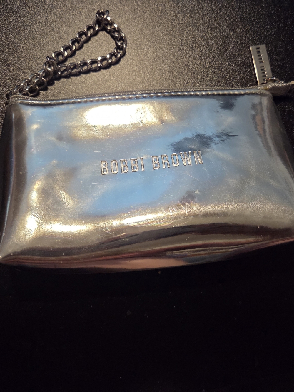 Bobbi Brown Metallic Silver Wristlet with Chain Strap